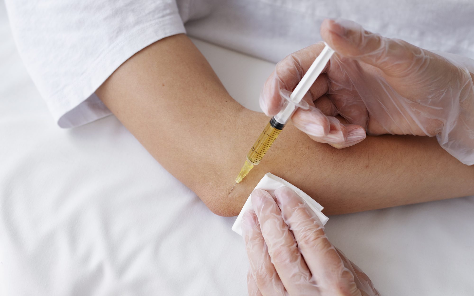 An injection being given into a joint.